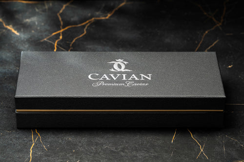 Closed Cavian luxury caviar gift box with textured black finish and silver Premium Caviar logo.